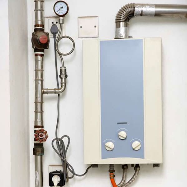 stock photo of a tankless water heater installed on wall